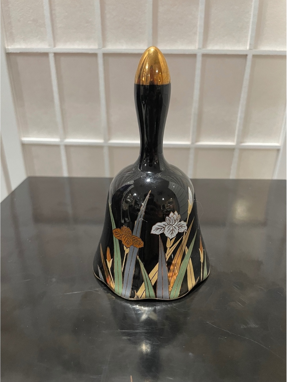 Vintage Japanese Black Ceramic Hand Bell with Gold-Tone Handle and Floral Design